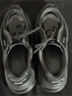 Prada Systeme Sneakers / Shoes marked size 7.5.
Unusual design